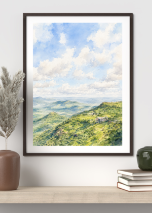 Watercolor landscape painting of rolling green hills and misty mountains under a wide cloudy sky